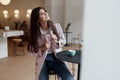 Beautiful women in a coffee shop with a cup of coffee Royalty Free Stock Photo