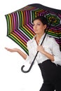Beautiful woman with colourful umbrella on white