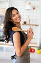 Young beautiful woman cooking healthy food in the kitchen. Healthy lifestyle, food, diet concept