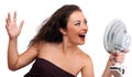 Beautiful woman with cooler fan Royalty Free Stock Photo