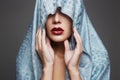 Red lips girl in hood.islamic style woman