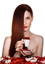 Beautiful woman and cup of rose petals Royalty Free Stock Photo