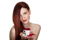 Beautiful woman and cup of rose petals Royalty Free Stock Photo