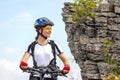 Beautiful woman cyclist on a bicycle in nature. Healthy lifestyle and sports. Leisure and hobbies