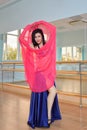 Beautiful woman dancing in arabic costume, oriental or belly dance Royalty Free Stock Photo