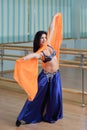 Beautiful woman dancing in arabic costume, oriental or belly dance Royalty Free Stock Photo