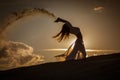 Beautiful woman dancing at gold sunset Royalty Free Stock Photo