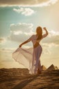 Beautiful woman dancing at sunset Royalty Free Stock Photo