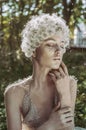 Beautiful woman with dandelion head beauty studio portrait photoshoot Royalty Free Stock Photo