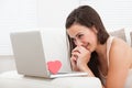Beautiful woman dating online on laptop Royalty Free Stock Photo