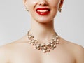 Beautiful woman with diamond necklace. Young beauty model with diamond pendant and earrings. Jewellery and accessories Royalty Free Stock Photo