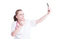 Beautiful woman doctor taking a selfie using phone Royalty Free Stock Photo