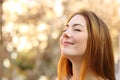 Beautiful woman doing breath exercises with an autumn background Royalty Free Stock Photo