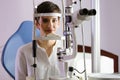 Woman doing eye test with optometrist in medical center Royalty Free Stock Photo