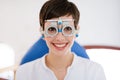 Woman doing eye test with optometrist in medical center Royalty Free Stock Photo