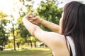 Beautiful woman doing stretching exercises on the floor.Young sportive woman doing exercising in summer park Royalty Free Stock Photo