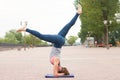 Beautiful woman doing Vriksasana pose on yoga class Royalty Free Stock Photo