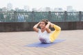 Beautiful woman doing Vriksasana pose on yoga class Royalty Free Stock Photo