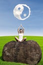 Beautiful woman doing yoga meditation under ying yang cloud Royalty Free Stock Photo