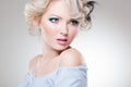 Beautiful woman with doll face wearing make-up Royalty Free Stock Photo