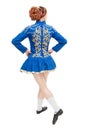 Beautiful woman in dress for Irish dance back pose isolated Royalty Free Stock Photo