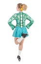 Beautiful woman in dress for Irish dance back pose isolated Royalty Free Stock Photo