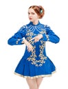 Beautiful woman in dress for Irish dance pointing on hand isolated Royalty Free Stock Photo