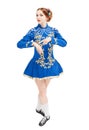 Beautiful woman in dress for Irish dance pointing on hand isolated Royalty Free Stock Photo