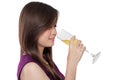 Beautiful woman drink champagne, on white