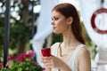 beautiful woman drinking coffee outdoors Relaxation concept Royalty Free Stock Photo