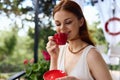 beautiful woman drinking coffee outdoors unaltered Royalty Free Stock Photo