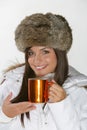 Beautiful woman drinking warm beverage Royalty Free Stock Photo