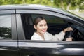 Beautiful woman is driving her car