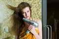 Beautiful woman drying her hair Royalty Free Stock Photo