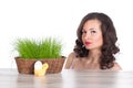 Beautiful woman with easter basket with green grass, chicken and smiling egg Royalty Free Stock Photo