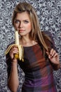 Beautiful woman eating banana Royalty Free Stock Photo