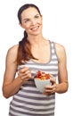 Beautiful woman eating a bowl of cereal Royalty Free Stock Photo