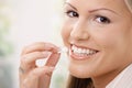 Beautiful woman eating chewing gum Royalty Free Stock Photo