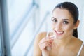 Beautiful woman eating chewing gum Royalty Free Stock Photo