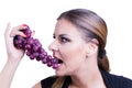 Beautiful Woman eating grapes Royalty Free Stock Photo