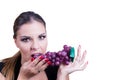 Beautiful Woman eating grapes Royalty Free Stock Photo