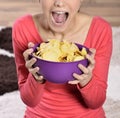 Beautiful woman eating junk food