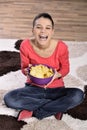 Beautiful woman eating junk food Royalty Free Stock Photo