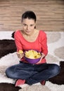 Beautiful woman eating junk food Royalty Free Stock Photo