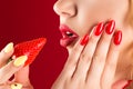 Beautiful woman eating strawberry close up Royalty Free Stock Photo