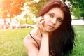 Beautiful woman enjoying daisy field, nice female lying down in meadow of flowers, pretty girl relaxing outdoor, having fun, Royalty Free Stock Photo