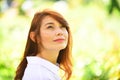 Beautiful woman enjoying daisy field, nice female in meadow. Pretty girl relaxing outdoor, having fun. Happy young lady Royalty Free Stock Photo