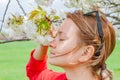 Spring allergy. Beautiful woman enjoying nature blooming tree Royalty Free Stock Photo