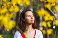 Beautiful woman enjoying spring sun Royalty Free Stock Photo