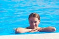 Beautiful woman enjoying in swimming pool Royalty Free Stock Photo